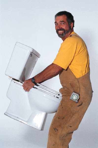 man moving toilet